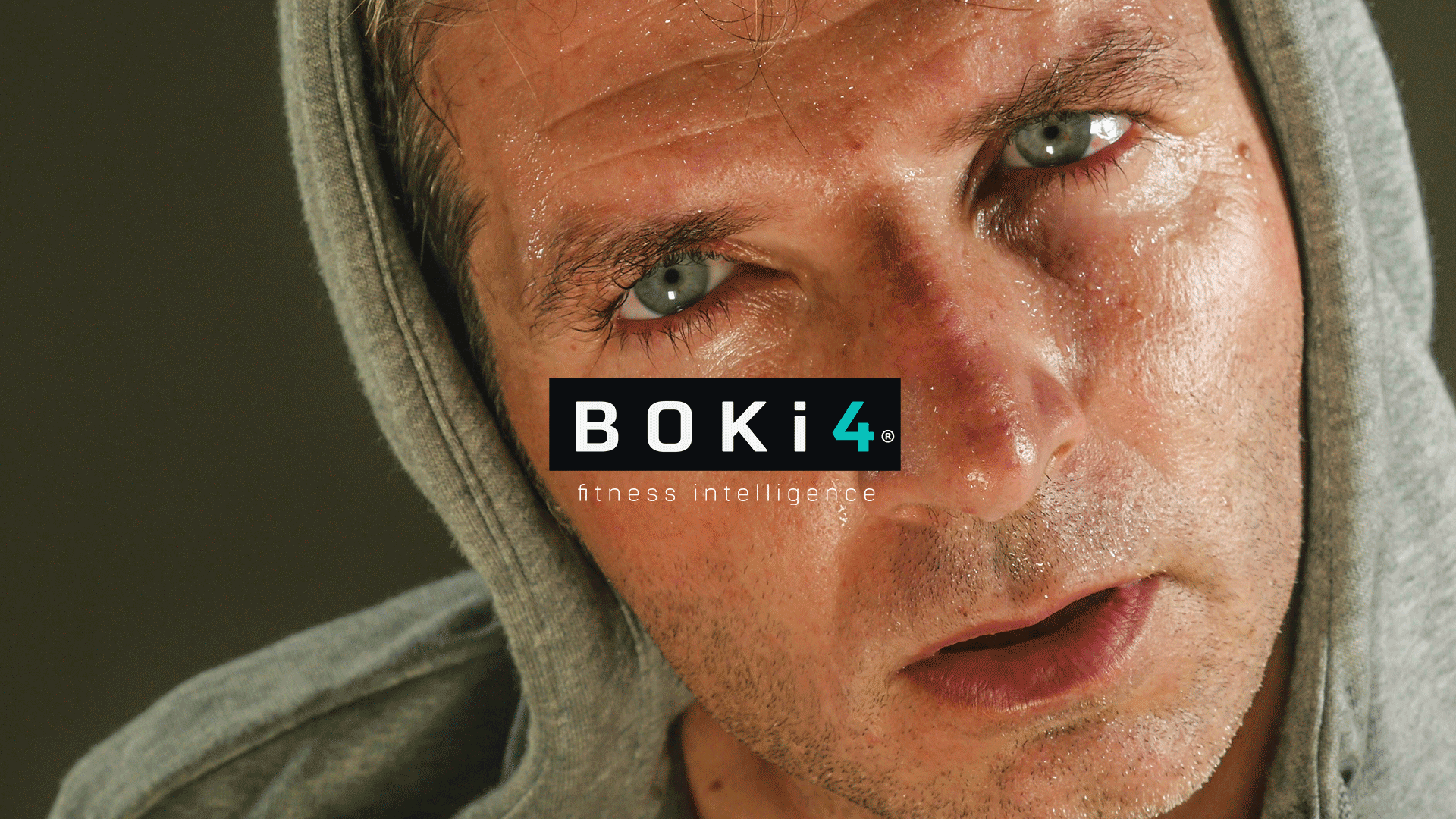 Person wearing a hood with 'BOKi4' logo overlay