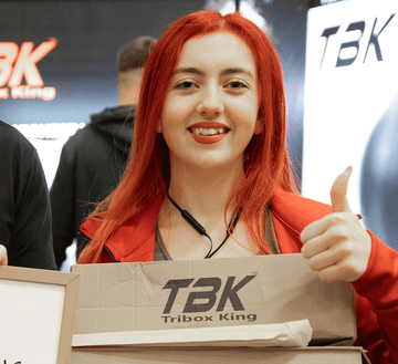 Lady holding the Triboking sustainable packaging