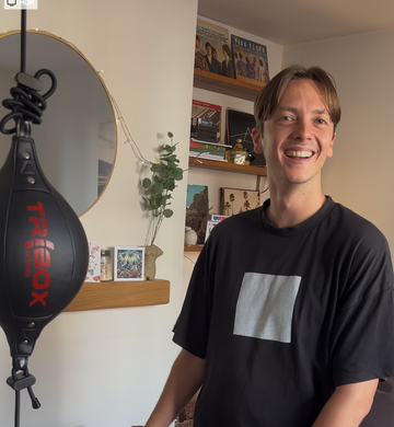 a young man at home with TriboxKing