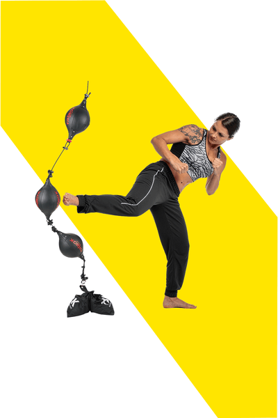 Woman kickboxing using the Triboxking