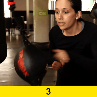 Woman in gym using Triboxking